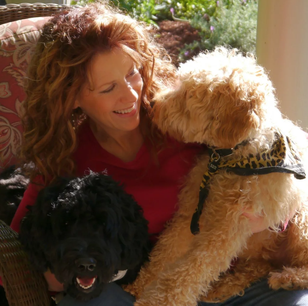 Mary with her Labradoodles